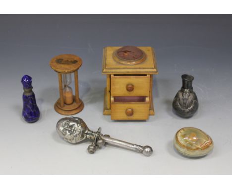 A late 19th Century Mauchline ware novelty needlework box in the form of a two drawer chest with pincushion top, the sides tr