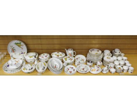 A large collection of Royal Worcester 'Evesham' pattern tableware, including two large quiche dishes, three small quiche dish