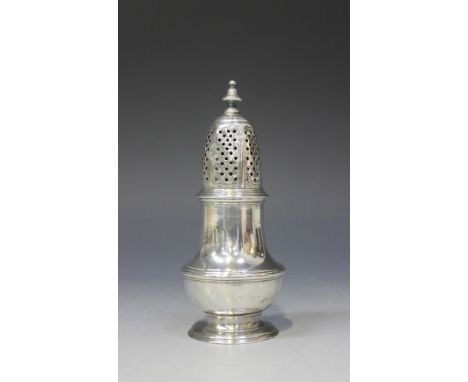 A George II silver pepper caster of baluster form with pierced domed cover and knop finial, on a circular foot, London 1727, 