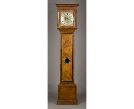 An 18th Century burr walnut longcase clock with eight day movement striking on a bell, the square brass dial with matt centre