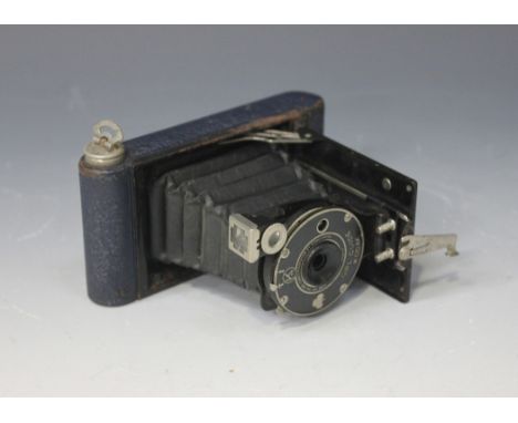 A Kodak girl guide camera, No. 99804, with dark blue crackle finished case and black bellows.