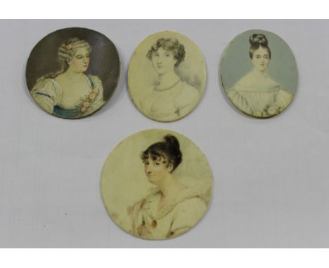 19th Century British School - Oval Miniature Portrait of a Lady with her Hair in a Plaited Bun, watercolour on ivory, approx 