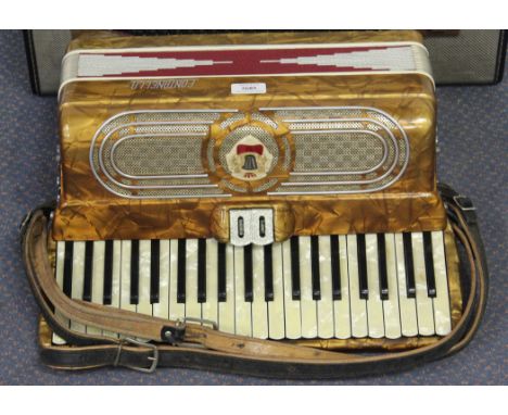 A mid-20th Century piano accordion by Fontanella, together with a cased xylophone and a violin, marked 'Stainer', length of b