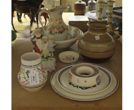 A group of five pieces of Poole Pottery, comprising a vase decorated with cockerels amongst flowers, two plates, a dish and p