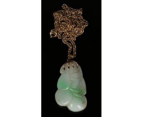 A Chinese carved jade pendant in the form of two gourds and vines, length approx 5cm, fitted with a 9ct gold multiple link ne