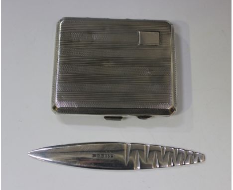 A George V silver rectangular cigarette case, with engine turned and reeded decoration, Birmingham 1943 by Morgan & Boon, len