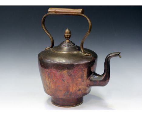 A Victorian oversized copper kettle with overhead handle, the lid with acorn finial, height approx 43cm.
