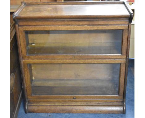 An Edwardian Oak Two Tier Globe Wernicke Style Glazed Bookcase, 87cm wide 