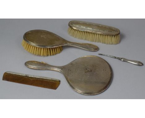 A Silver Mounted Hair Brush and Hand Mirror Monogrammed A Together a Silver Mounted Comb, Clothes Brush and a Button Hook 