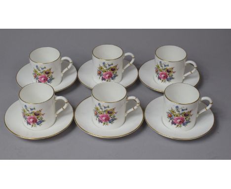 A Set of Six Royal Worcester Floral Pattern Coffee Cans and Saucers 