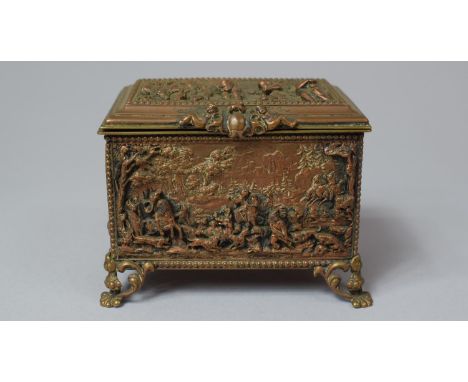 An Early 20th Century Continental Copper Jewellery Box Decorated in High Relief with Hunting Scenes, Children Playing and Mai