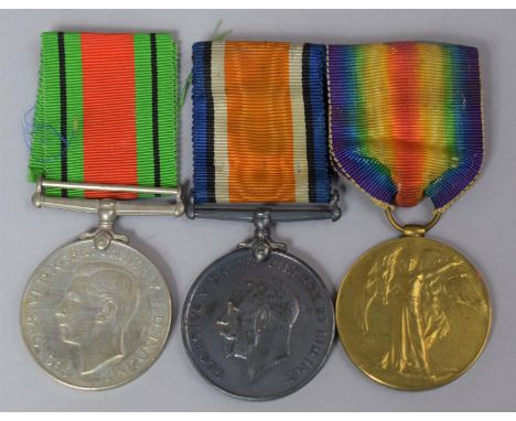 A Pair of WWI Medals Awarded to Gunner W Trevor, Royal Artillery, no.150258 Together with a WWII Defence Medal and Ribbons 