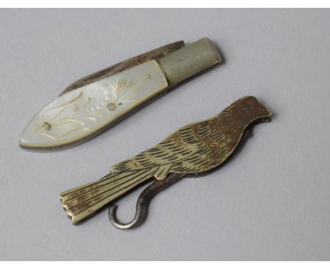 A Pretty Mother of Pearl Mounted Fruit Knife Together with a Novelty Folding Button Hook in the Form of a Bird 