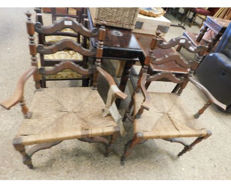 PAIR OF CONTINENTAL WALNUT ARMCHAIRS WITH LADDER TYPE BACK AND RATTAN SEATS ON A SHAPED X STRETCHER AND TURNED LEGS 