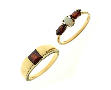 Garnet and opal 9ct gold three-stone ring, size O approx, 1.2g gross approx, and a garnet single stone 9ct gold ring, size N 