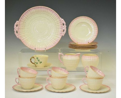 Collection Belleek teawares, comprising cake plate, six tea plates, six cups, three saucers, milk jug and sugar basin, and a 