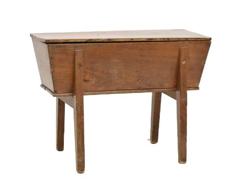 19th century oak dough bin or trough, of typical lidded sarcophagus form with notch-carved corners on splayed supports, 101cm