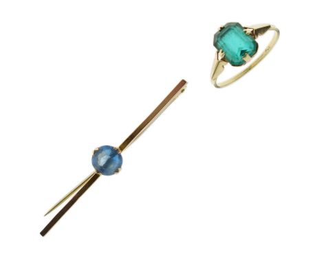 Bar brooch set blue paste stone, the bar stamped '9ct', metal pin, 5cm wide approx, together with a dress ring set green past