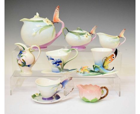 Collection of Franz porcelain teawares, decorated in high relief with butterflies, flowers, etc, comprising teapot, milk jug,