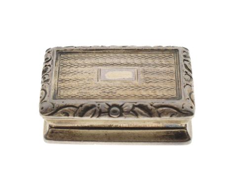 Regency silver vinaigrette, of typical hinged rectangular form with vacant rectangular cartouche, wavy engine-turned field an