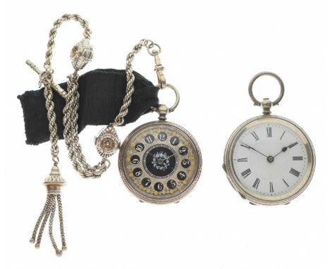 Two Continental white metal-cased open-face fob watches, the first with decorated cellular Arabic dial, the case stamped 'Fin