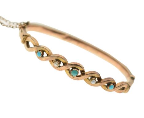 Early 20th century turquoise and seed pearl snap bangle, the yellow metal tagged '9ct', attached safety chain, inscription da