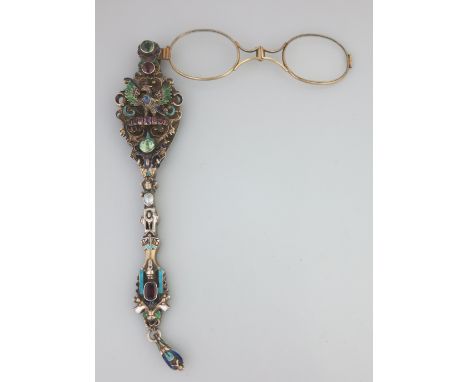 A PAIR OF SILVER GILT LORNGETTES pierced and enamelled to the front with inset gems and engraved with scrolling foliage to th