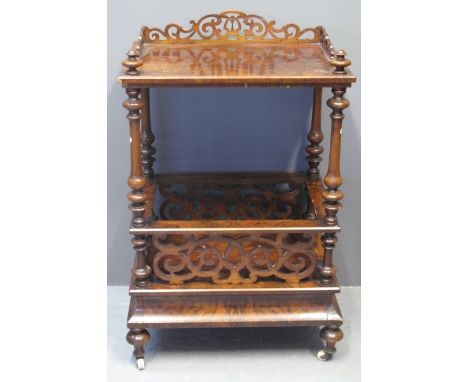 VICTORIAN BURR WALNUT MUSIC CANTERBURY OR WHATNOT having pierced scroll decorated gallery above an under shelf and fitted dra