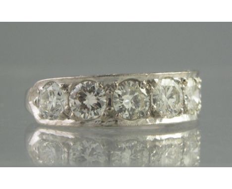 AN 18CT WHITE GOLD AND DIAMOND HALF ETERNITY STYLE RING, the seven brilliant cut diamonds an estimated total weight of 2cts. 