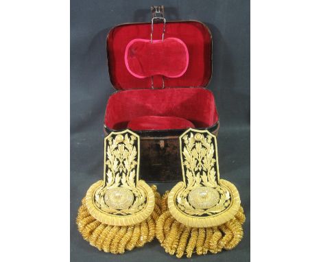 A PAIR OF EARLY 19TH CENTURY GOLD BRAID AND WIRE WORK MILITARY EPAULETTES overall decorated with foliate designs on velvet ba
