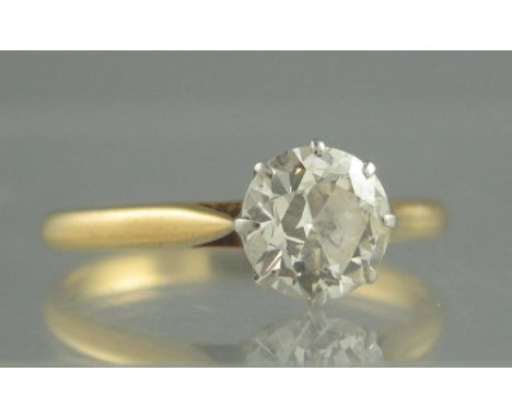 AN 18CT GOLD DIAMOND SOLITAIRE RING. The brilliant cut diamond an estimated diamond weight 1.11cts. Ring size P. Weight 2.7g 