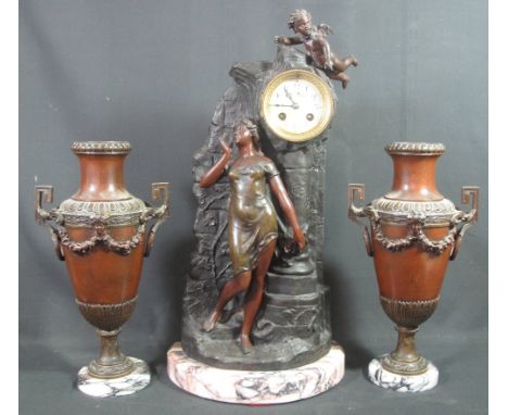 19TH/EARLY 20TH CENTURY FRENCH BRONZED SPELTER FIGURAL CLOCK GARNITURE, the clock with painted enamel face having Arabic nume