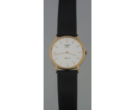 LONGINES PRESENCE GENTLEMAN'S 9CT GOLD QUARTZ DRESS WATCH having white dial with baton numerals and leather strap, number 24.