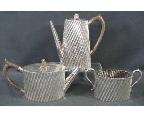 VICTORIAN SILVER PART WRITHEN DESIGN TEASET comprising diagonally fluted oval section teapot, similar tapering conical coffee