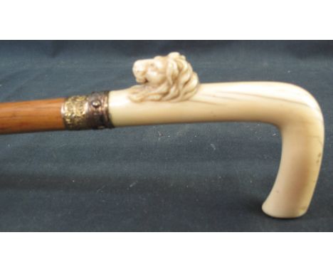 19TH CENTURY IVORY AND MALACCA CANE SWORD STICK, the sword stick opening to reveal double edged tapering steel blade, the ivo