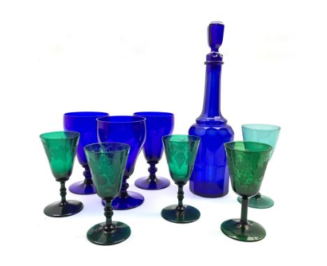 Three Georgian green wine glasses the bowls etched with fruiting vines, a matching wine glass, 19th century Bristol Blue glas