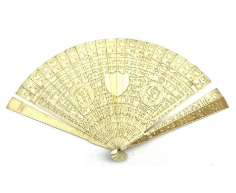 19th century Chinese Canton carved ivory brise fan: each pierced stick intricately carved on one side with central shield-sha