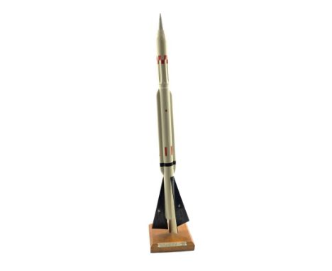 Presentation painted wooden model of a Missile with a presentation plaque 'TO COMD ARMY GP TPT COLM BY 6 COY RASC (GW) MAY 19