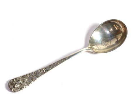 Tiffany &amp; Co, a presentation silver soup spoon or ladle, London 1933, finely decorated with a ram's head terminal, the bo