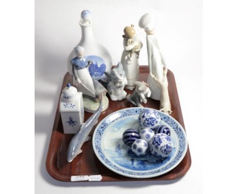 A Meissen tea caddy; four Lladro figures; Copenhagen; blue and white carpet boules