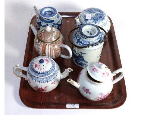 Five Chinese teapots and tea caddy 