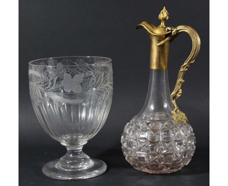 GILT METAL MOUNTED CLARET JUG, of globe and shaft form, the handle formed as scrolling vines, height 21cm; together with a fo