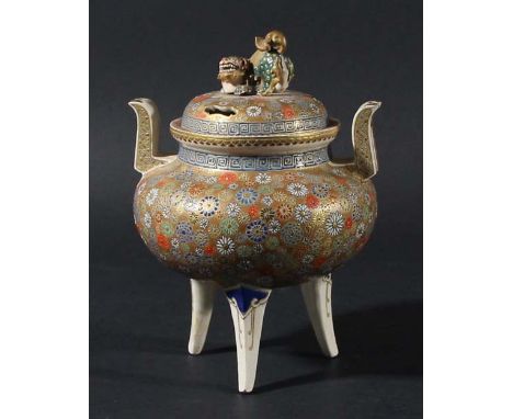 JAPANESE SATSUMA KORO AND COVER, Meiji, an all over flowerhead design on a gilt ground beneath two handles and on a tripod ba