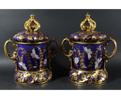 PAIR OF MASONS IRONSTONE STYLE TWO HANDLED VASES AND COVERS, early/mid 19th century, enamelled with butterflies amongst gilt 