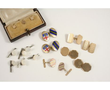 A PAIR OF 9CT. GOLD CUFFLINKS of octagonal shape with engine turned decoration, 4.6 grams, together with a pair of 9ct. gold 