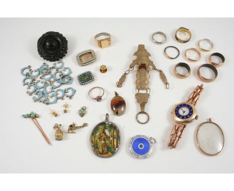 A QUANTITY OF JEWELLERY including a gold and enamel wristwatch with expanding bracelet, assorted gold rings, a pair of ruby a