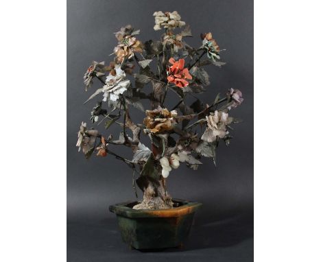 CHINESE HARDSTONE AND JADE TREE, with numerous branches of leaves and flowers from a main trunk, in a hexagonal jade type bow