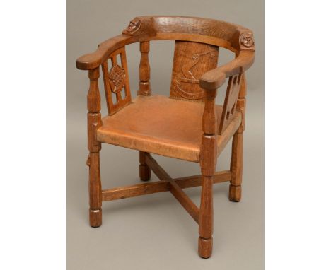 ROBERT THOMPSON OF KILBURN - MOUSEMAN MONKS CHAIR a circa 1920s/1930s oak Monk's armchair with a curved back and shaped arms,