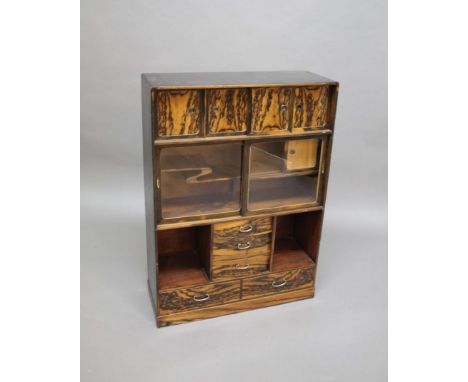 JAPANESE CABINET an interesting wooden cabinet with 4 sliding doors at the top, with a shaped shelf in the centre and glazed 