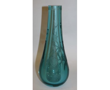 A CHINESE TURQUOISE GLASS VASE, the tall pear-form body etched with birds near and on a pine branch, the reverse with an oval